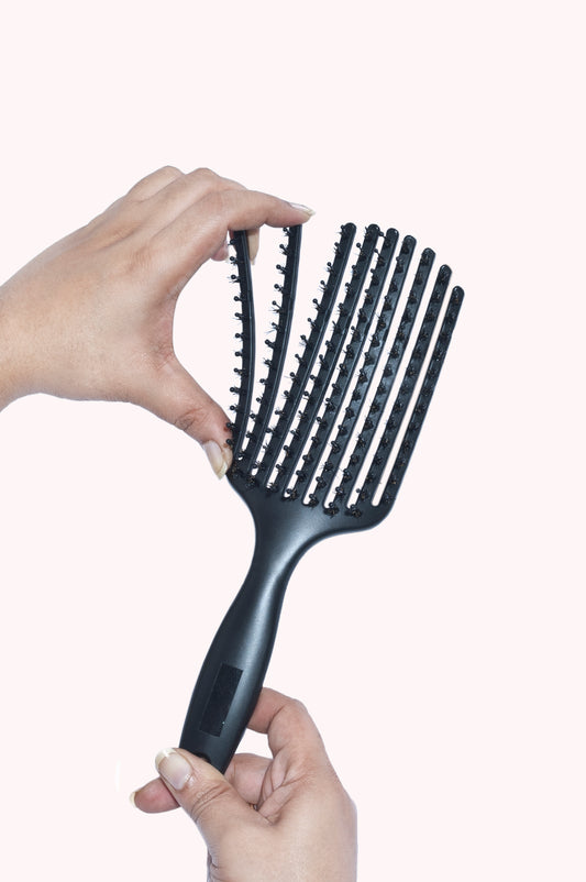 The Curved 9 Finger Boar Bristle Brush