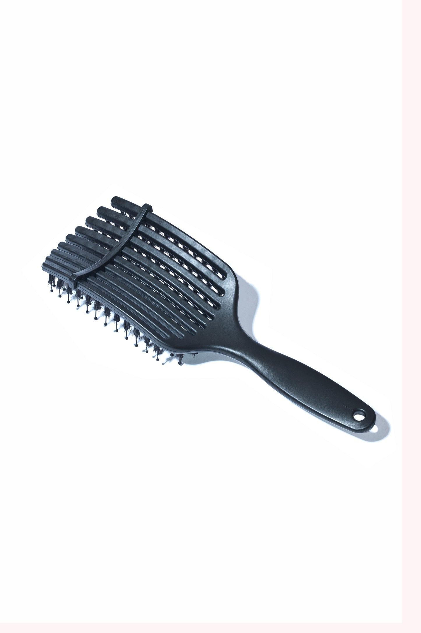 The Curved 9 Finger Boar Bristle Brush